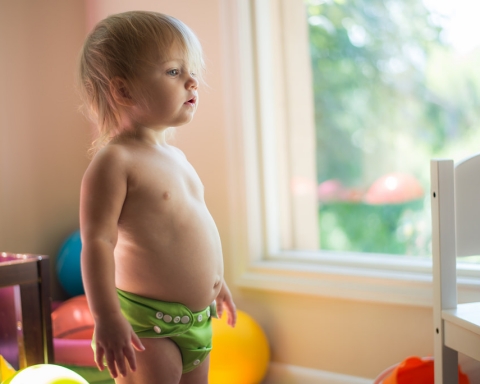 Baby wearing cloth diaper